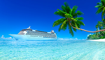 cruise ship next to an island with a palm tree
