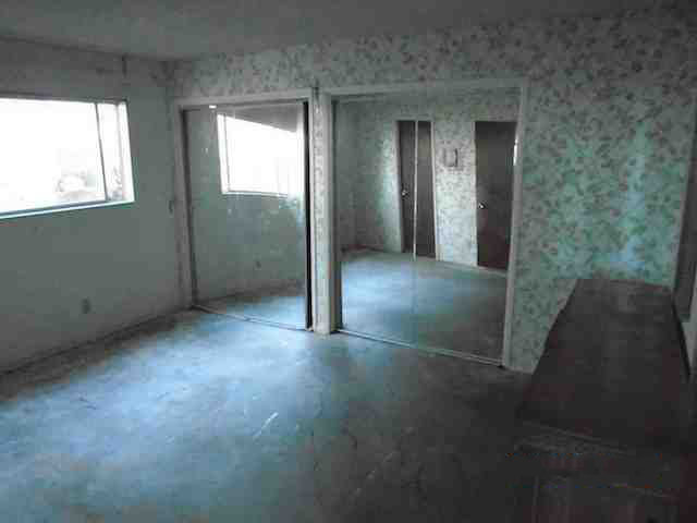 after picture of a hoarded master bedroom