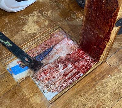 blood under the wood floor